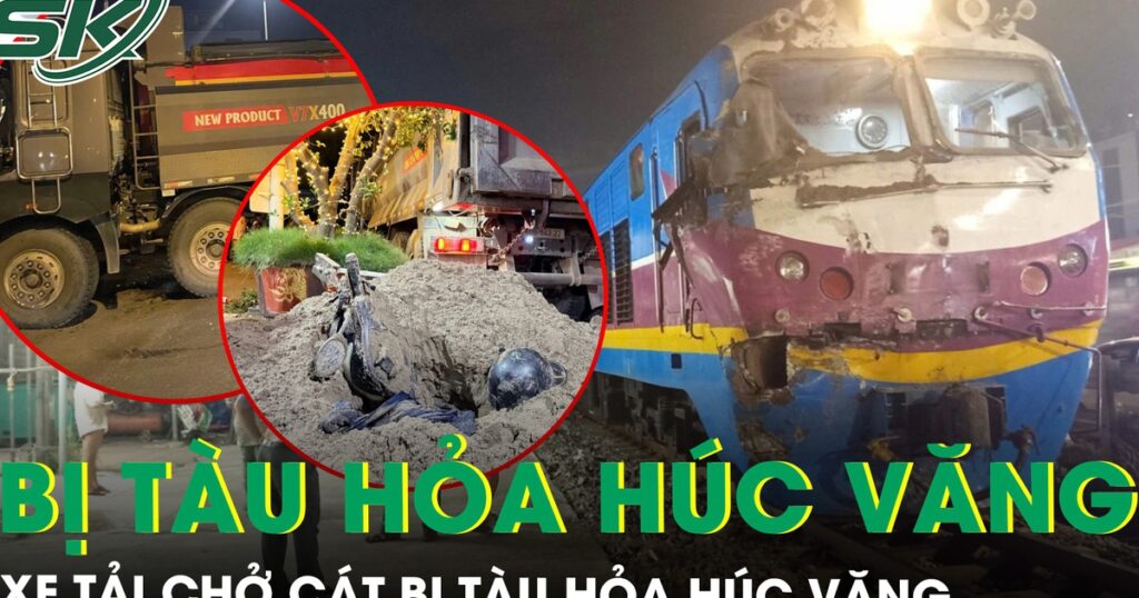 Cố vượt qua đường sắt, xe tải chở cát bị tàu hỏa húc văng, tài xế thoát nạn trong gang tấc